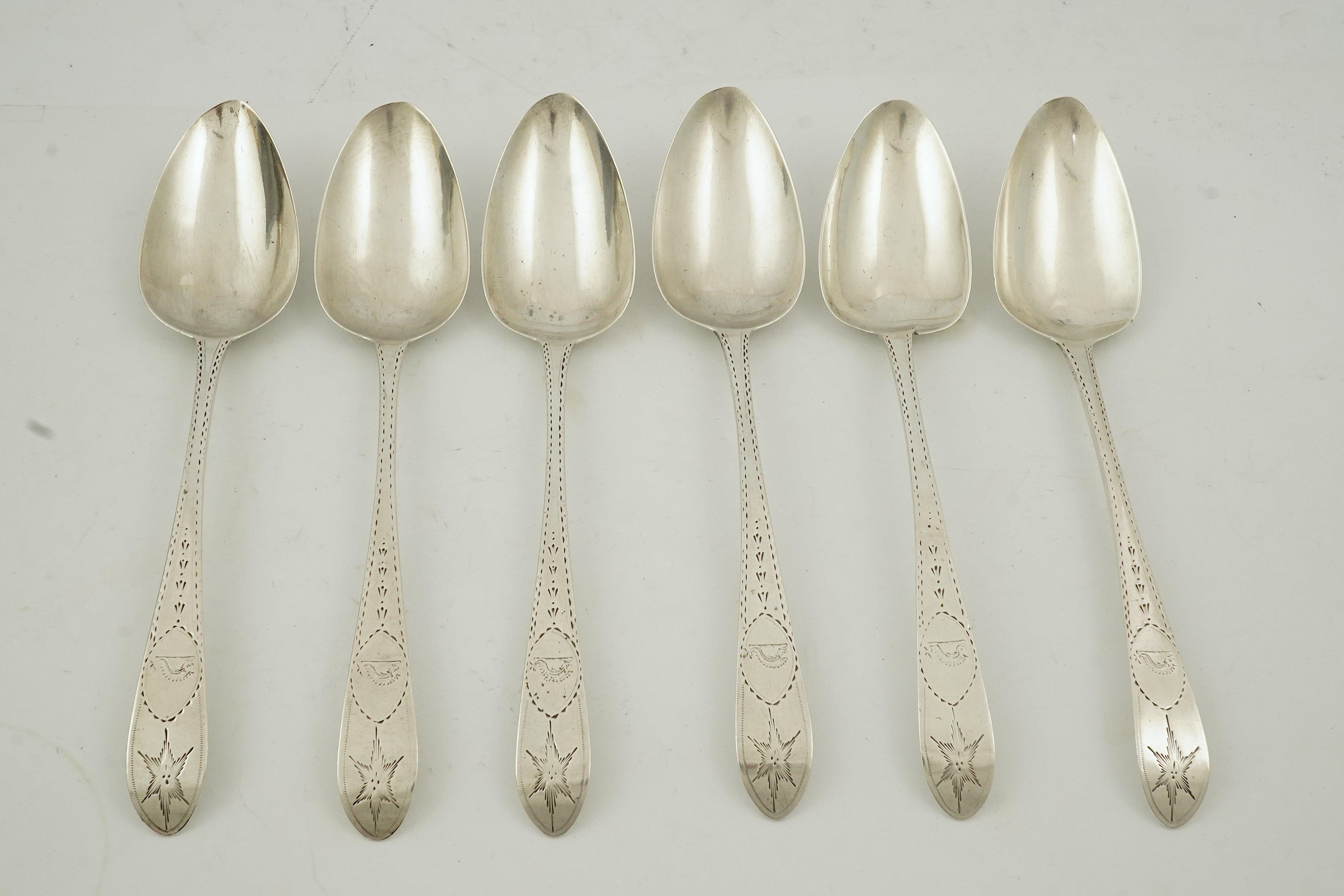 Five Victorian silver Old English pattern dessert spoons, by George Adams, London, 1880 and three other matched dessert spoons by Roberts & Dore, Sheffield, 1931, 11.6oz. Condition - fair